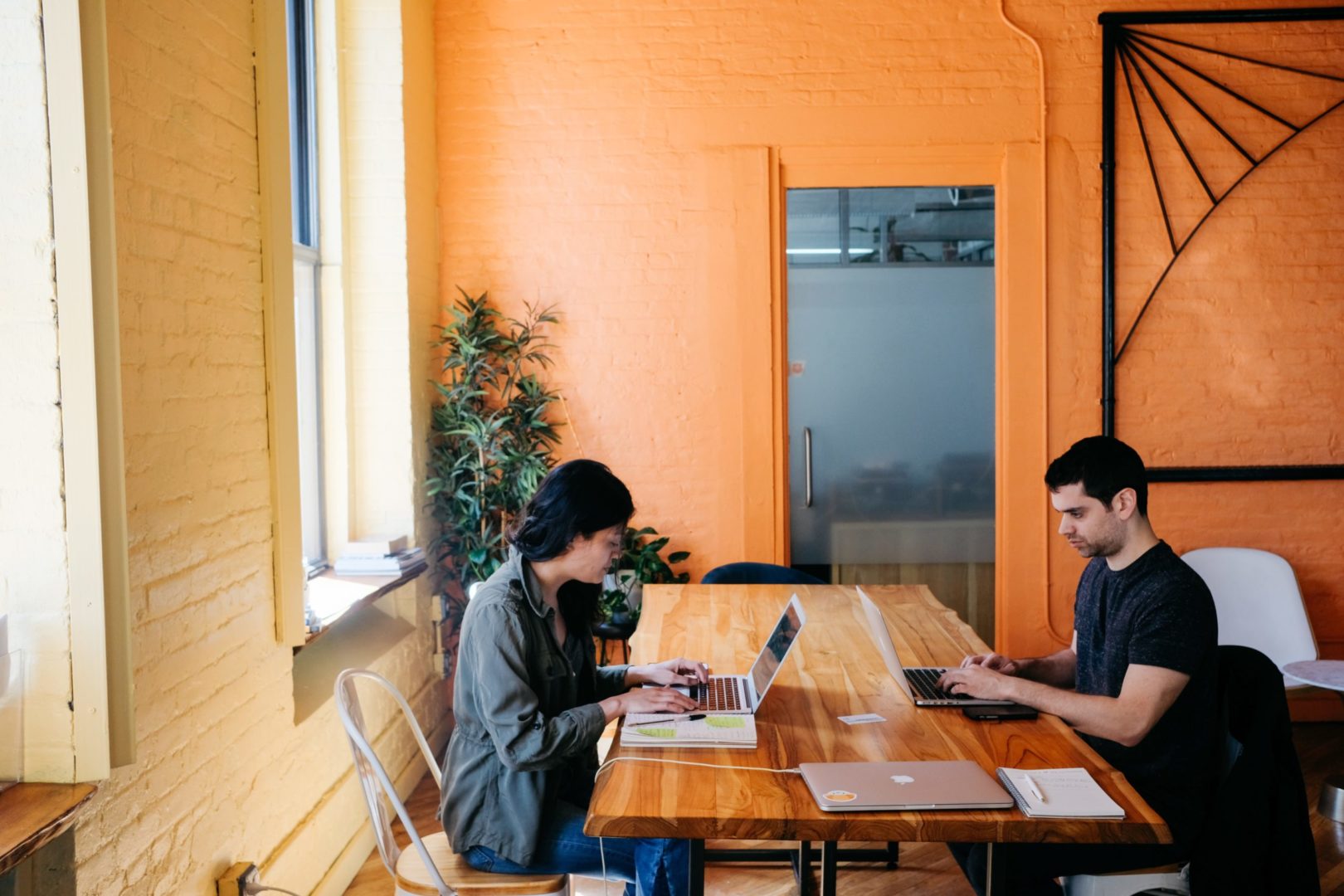 Two friends working out how to write a follow-up email