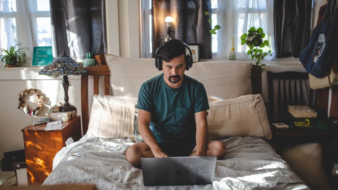 Man gets comfortable in his effort to stay sane working from home
