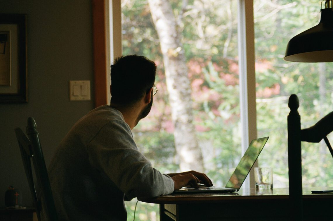 Man contemplates if remote working is good for his mental health
