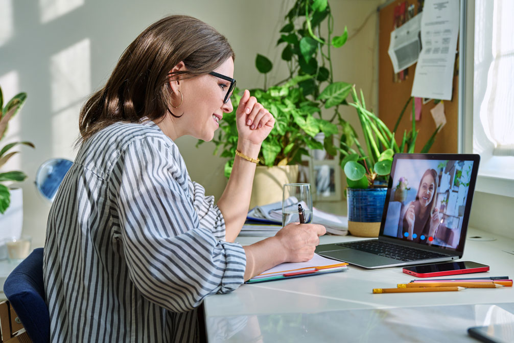 Lady interviewing another lady online